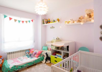 Habitación niños. Reforma de ático en Madrid por Araque Maqueda Construcción